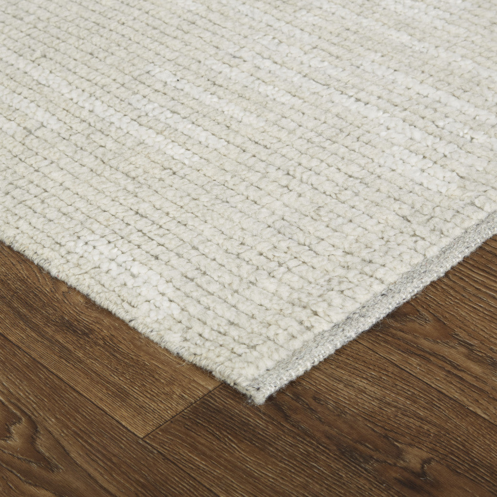 4' X 6' Tan and Ivory Wool Hand Knotted Area Rug