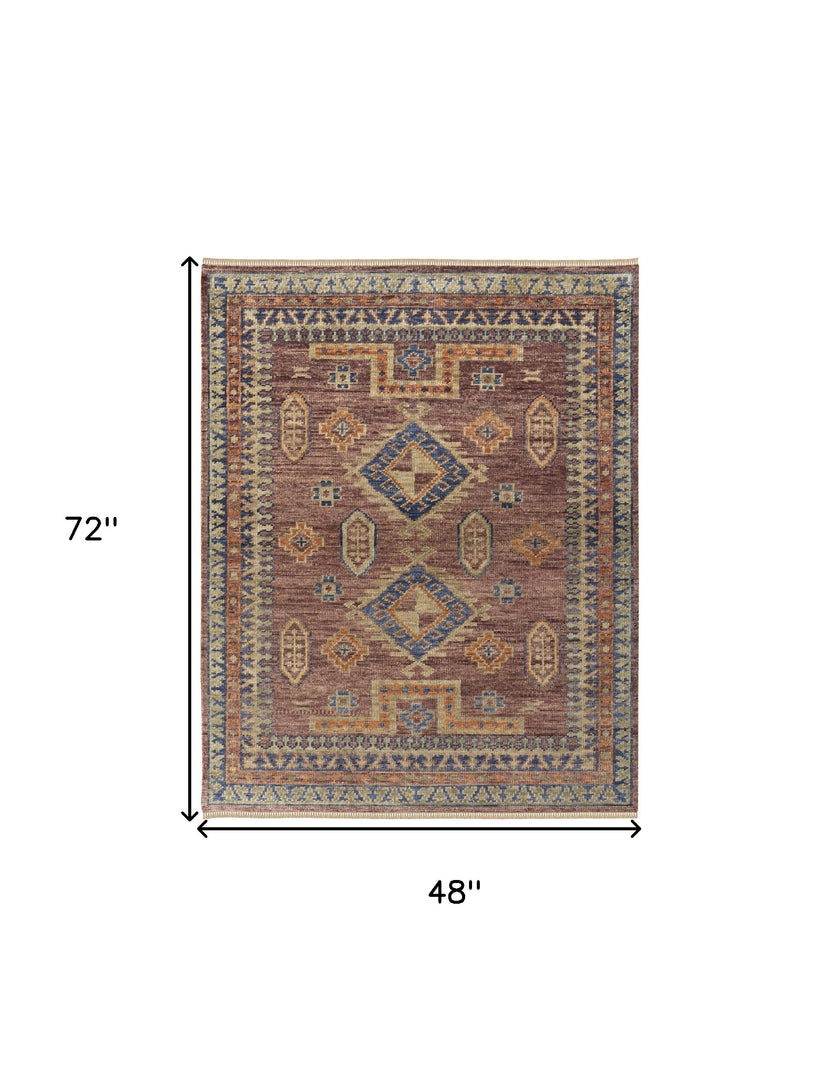 4' X 6' Blue Red and Tan Wool Geometric Hand Knotted Area Rug With Fringe