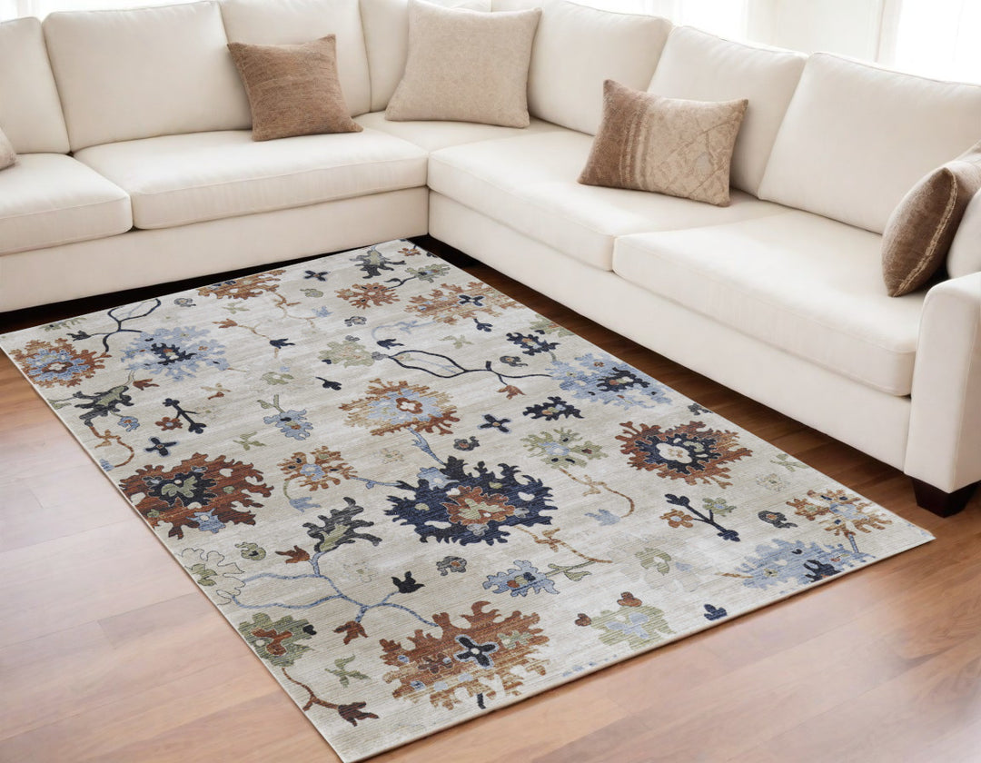 5' X 8' Ivory Red and Blue Floral Power Loom Area Rug