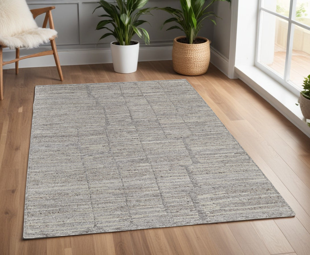 4' X 6' Taupe and Gray Abstract Hand Woven Worn Faded Area Rug