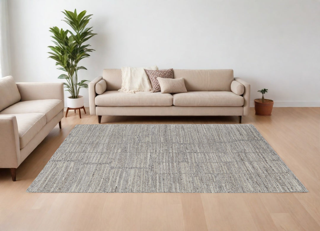 4' X 6' Taupe and Gray Abstract Hand Woven Worn Faded Area Rug