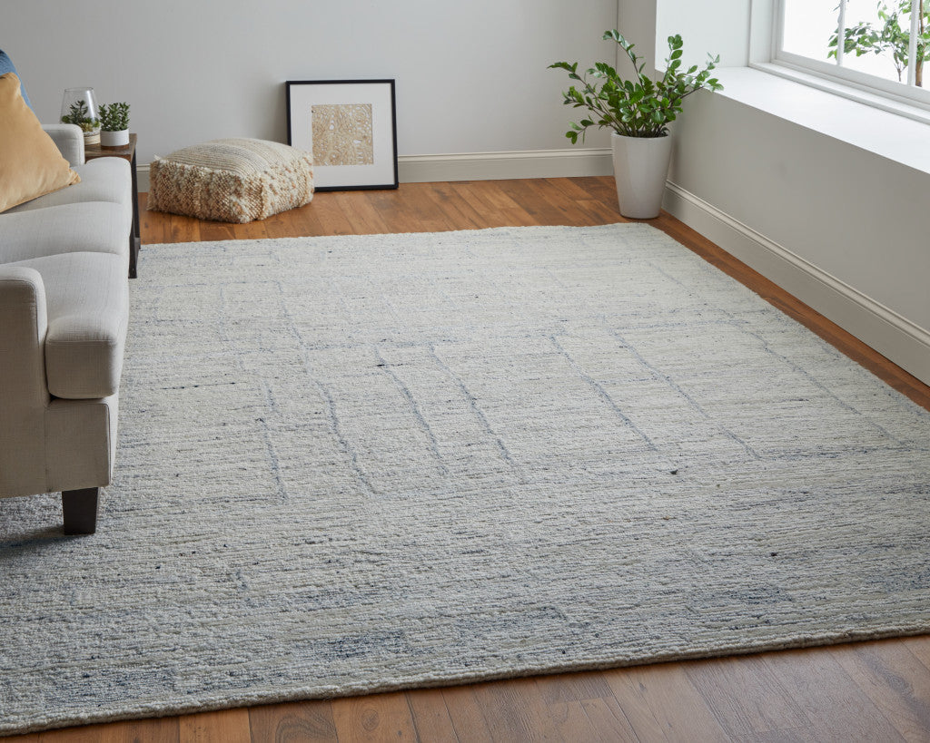 4' X 6' Gray and Ivory Abstract Hand Woven Worn Faded Area Rug