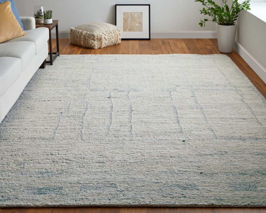 4' X 6' Gray and Ivory Abstract Hand Woven Worn Faded Area Rug