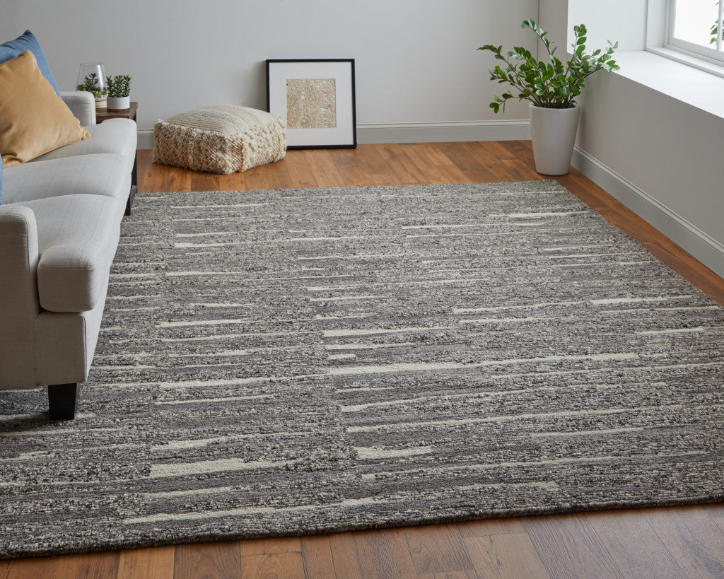 4' X 6' Gray Ivory and Taupe Abstract Hand Woven Area Rug