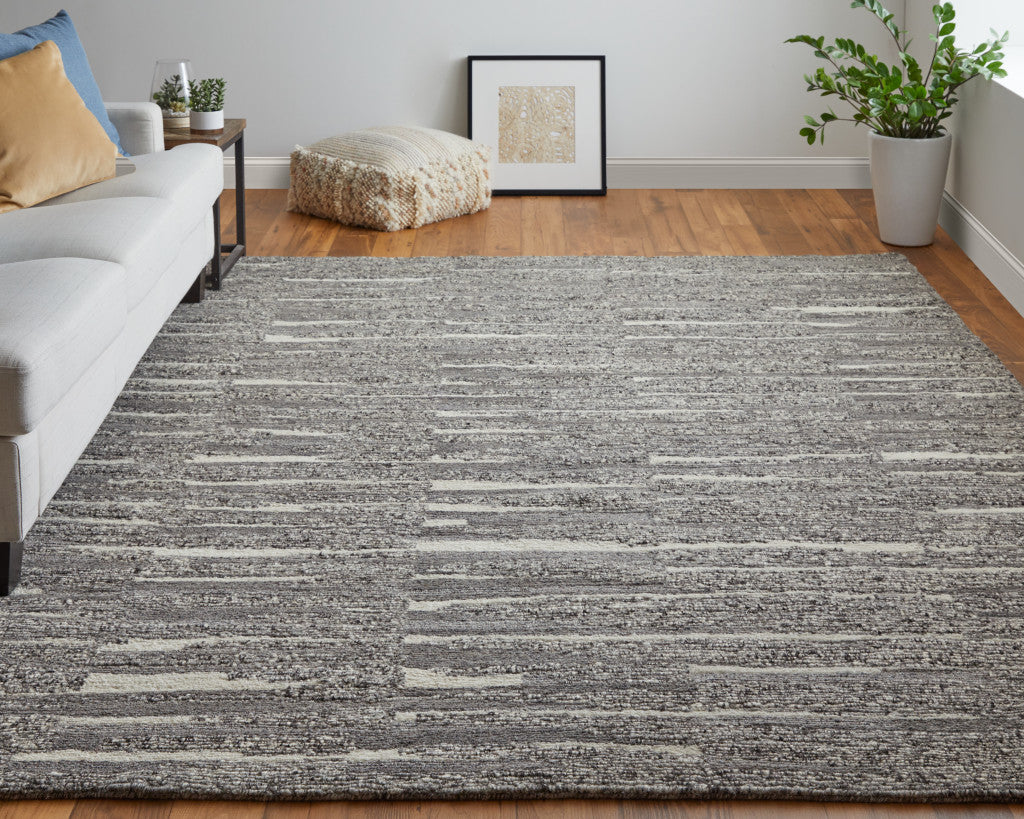 4' X 6' Gray Ivory and Taupe Abstract Hand Woven Area Rug