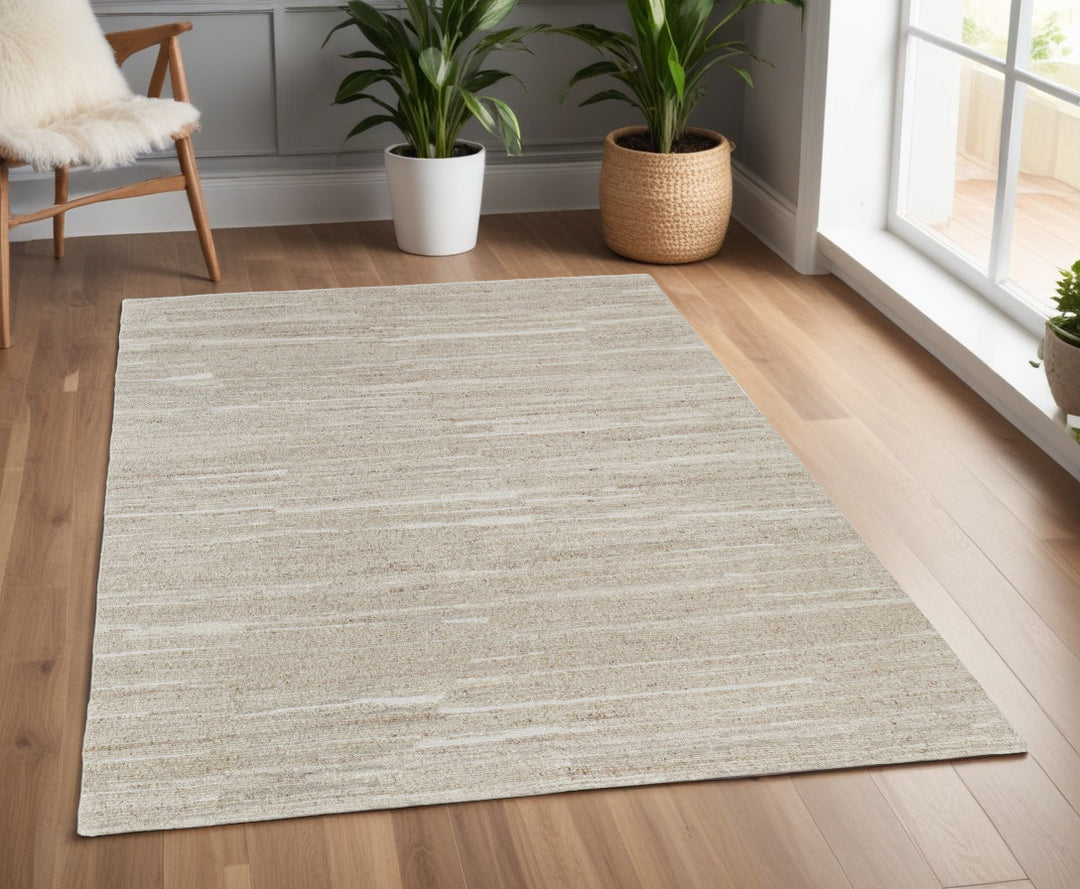 4' X 6' Ivory Abstract Hand Woven Worn Faded Area Rug