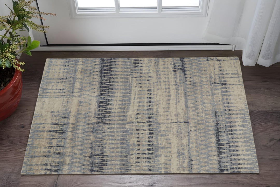 4' X 6' Gray Blue and Ivory Wool Abstract Hand Knotted Area Rug