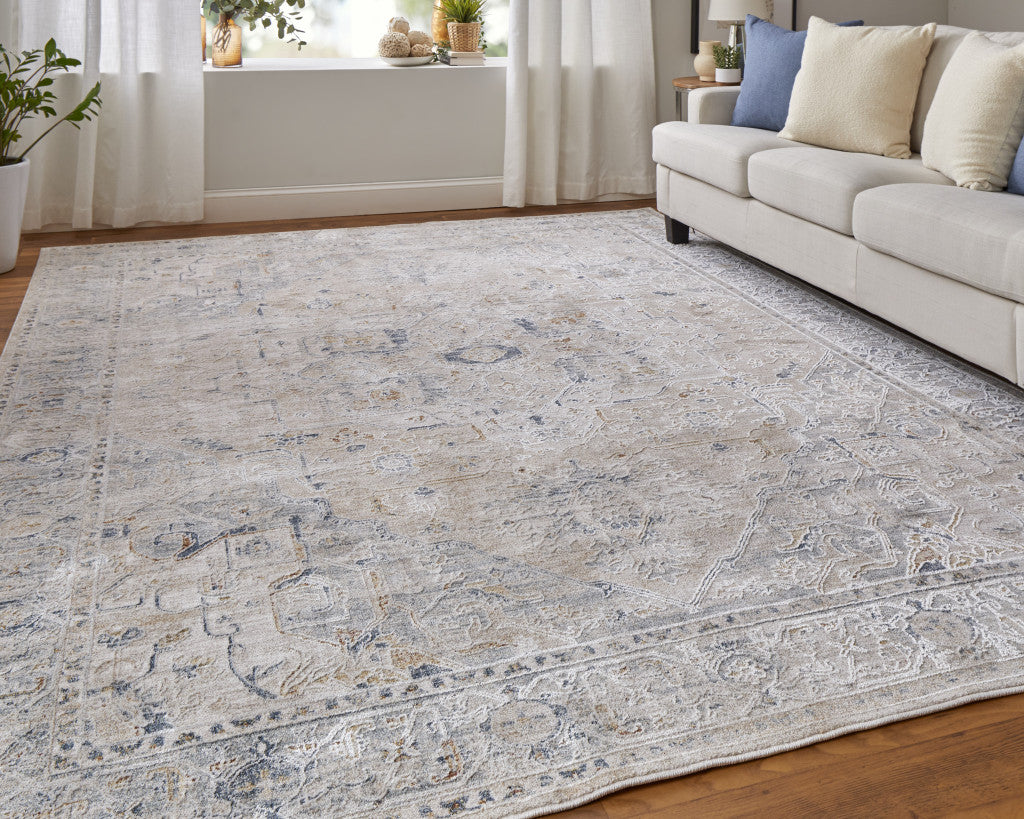 5' X 8' Ivory Taupe and Blue Oriental Power Loom Worn Faded Area Rug With Fringe