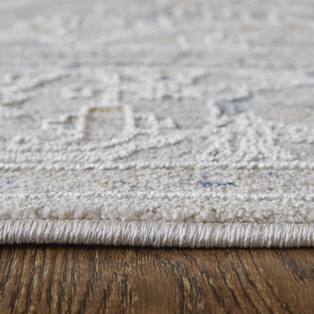 5' X 8' Ivory Taupe and Blue Oriental Power Loom Worn Faded Area Rug With Fringe