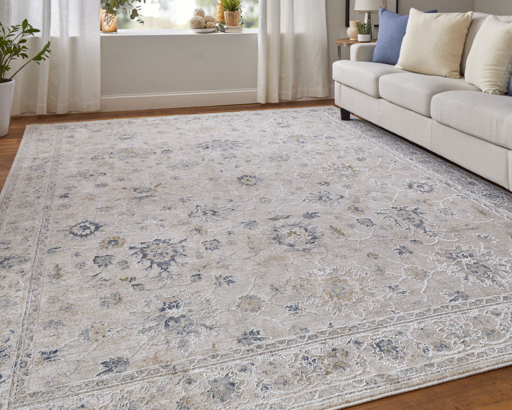 5' X 8' Ivory Taupe and Blue Floral Power Loom Worn Faded Area Rug With Fringe