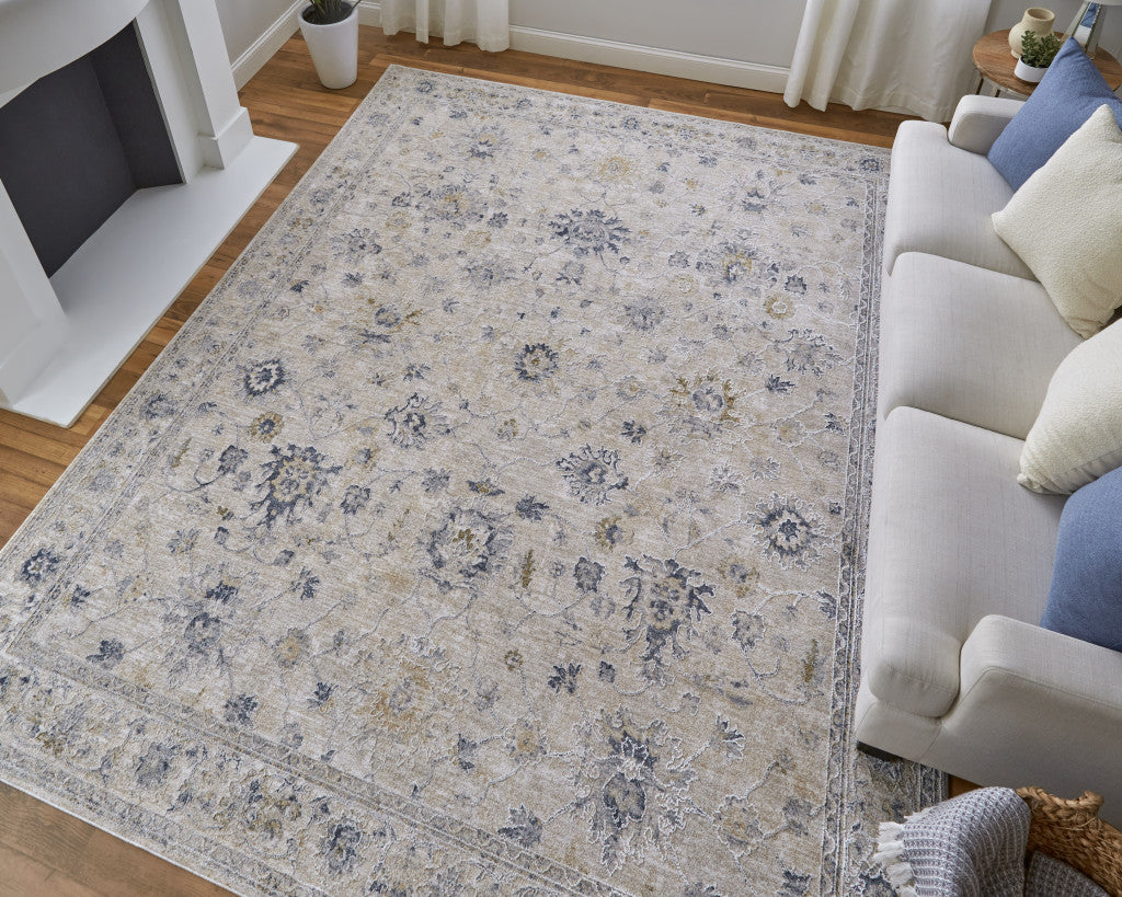 5' X 8' Ivory Taupe and Blue Floral Power Loom Worn Faded Area Rug With Fringe