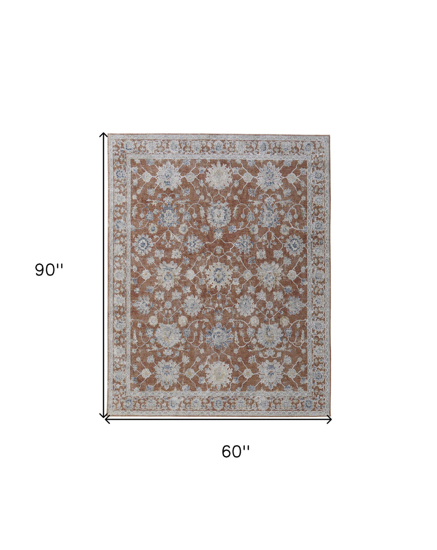 5' X 8' Ivory Taupe and Blue Floral Power Loom Worn Faded Area Rug With Fringe