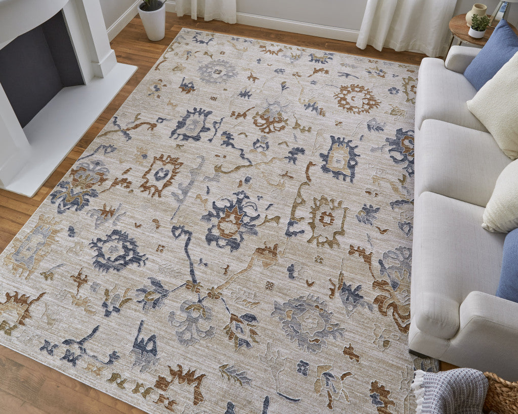 5' X 8' Ivory Blue and Gold Floral Power Loom Worn Faded Area Rug With Fringe