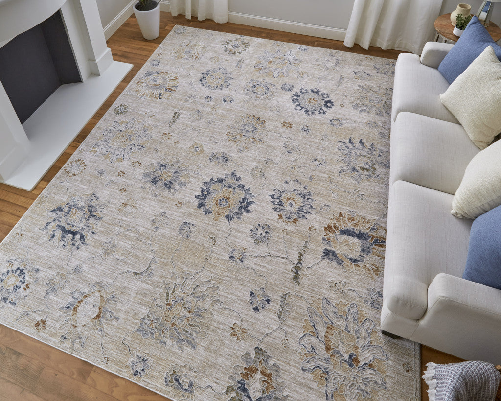 5' X 8' Ivory Taupe and Blue Floral Power Loom Worn Faded Area Rug With Fringe