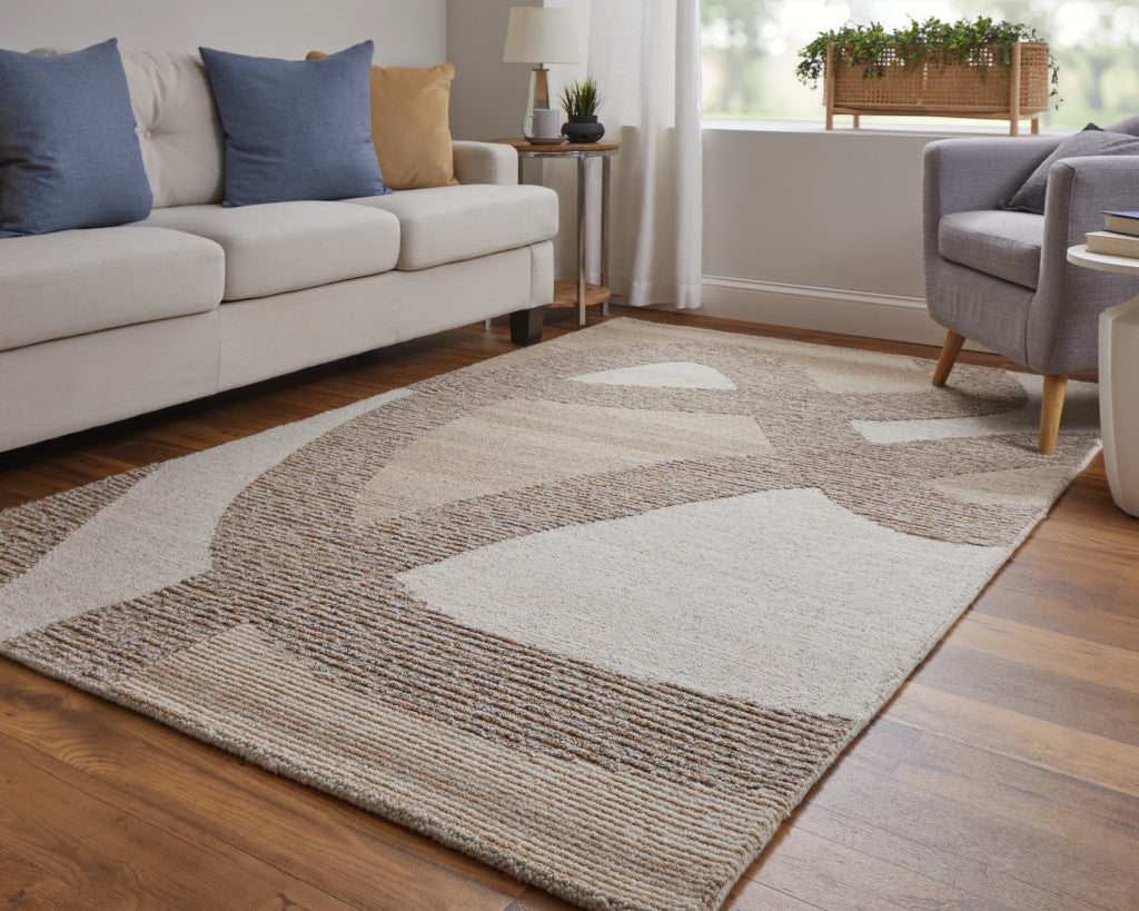 4' X 6' Brown Tan and Ivory Wool Abstract Hand Tufted Area Rug