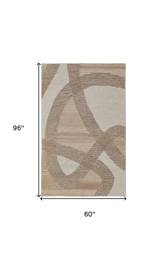 4' X 6' Brown Tan and Ivory Wool Abstract Hand Tufted Area Rug