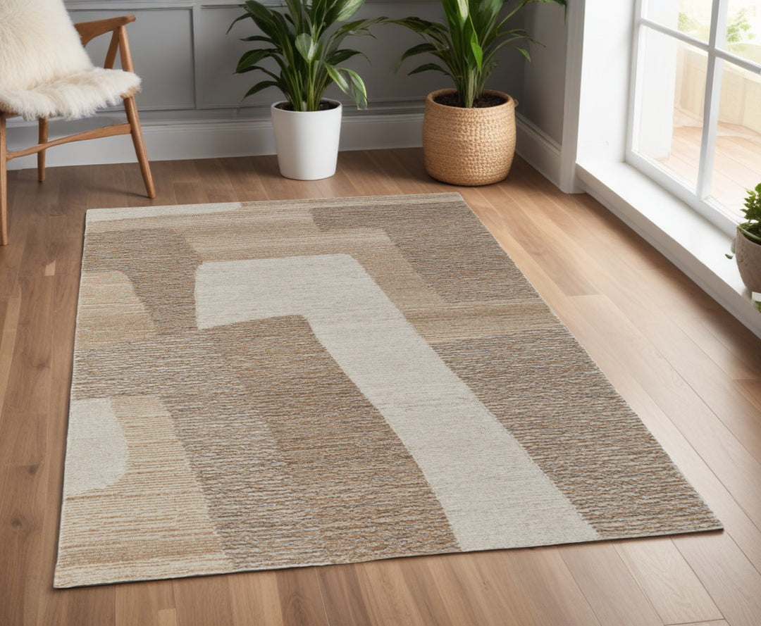 4' X 6' Brown Tan and Ivory Wool Abstract Hand Tufted Area Rug