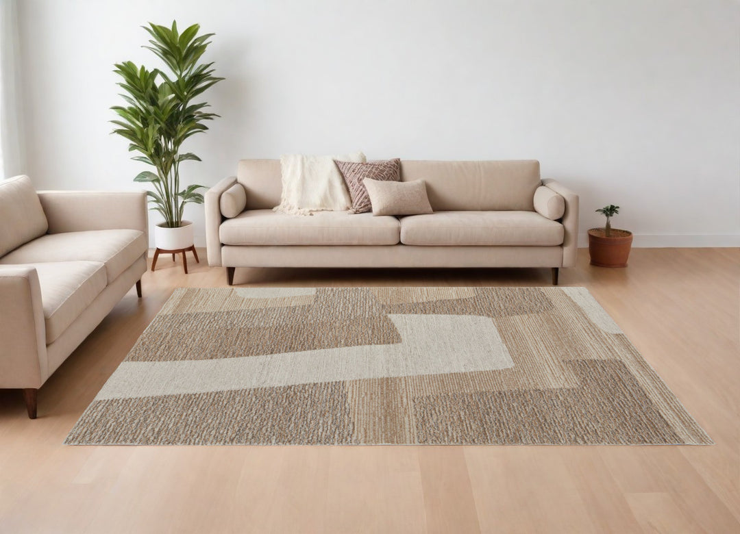 4' X 6' Brown Tan and Ivory Wool Abstract Hand Tufted Area Rug