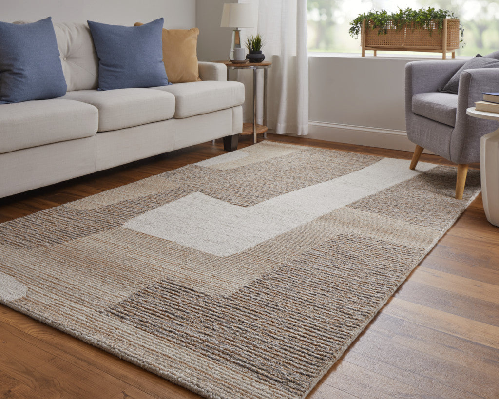 4' X 6' Brown Tan and Ivory Wool Abstract Hand Tufted Area Rug