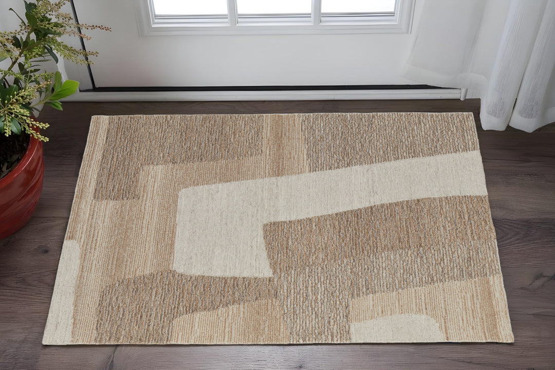 4' X 6' Brown Tan and Ivory Wool Abstract Hand Tufted Area Rug