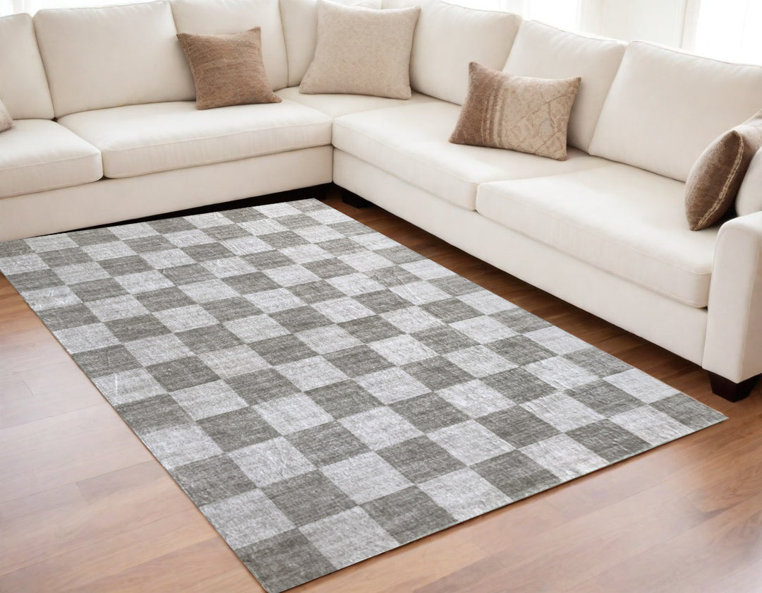 5' X 8' Beige and Brown Checkered Area Rug