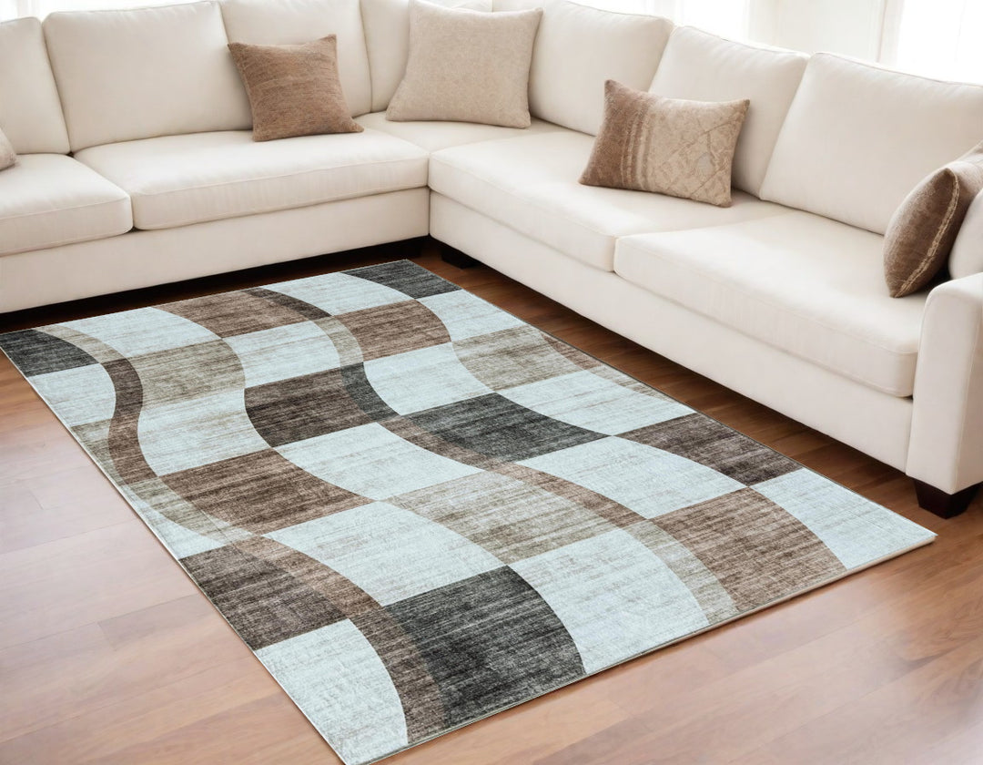 5' X 8' Beige Brown and Gray Checkered Area Rug