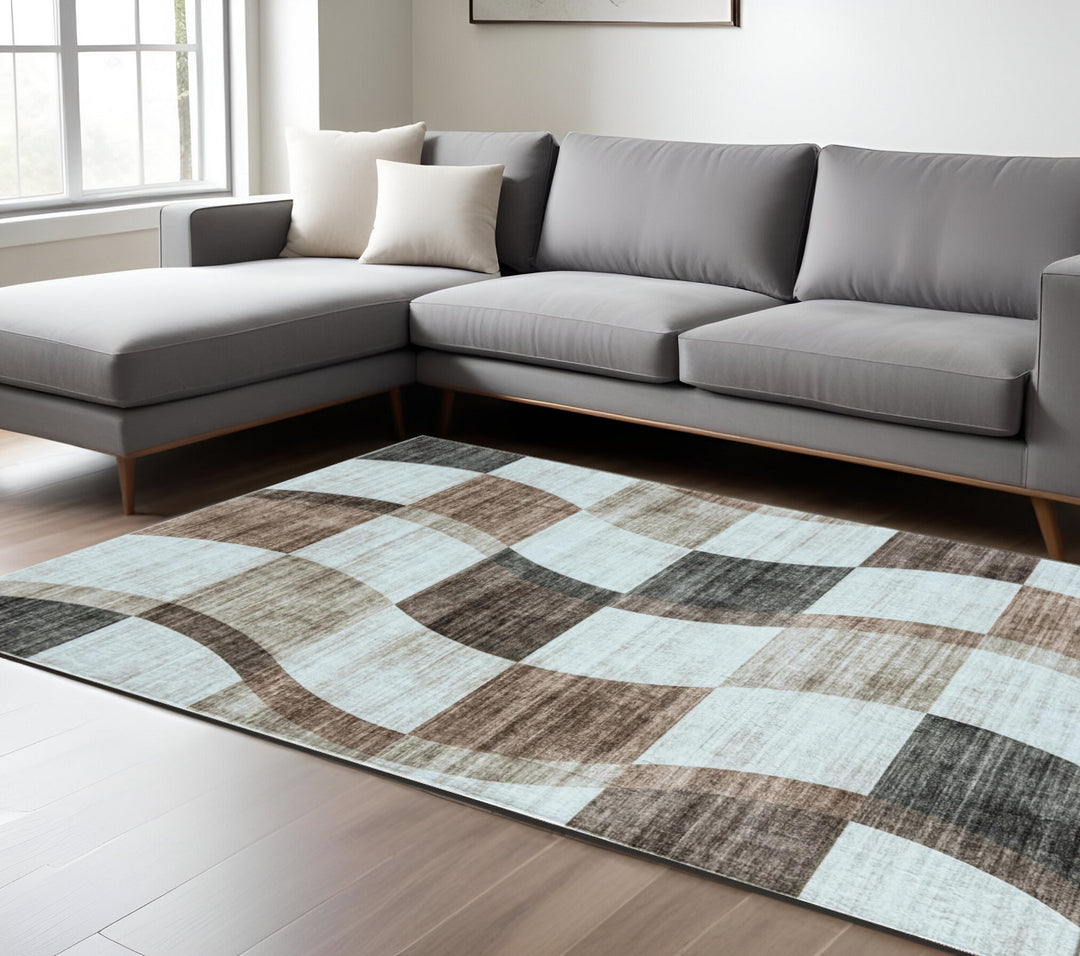 7' X 10' Beige Brown and Gray Checkered Area Rug