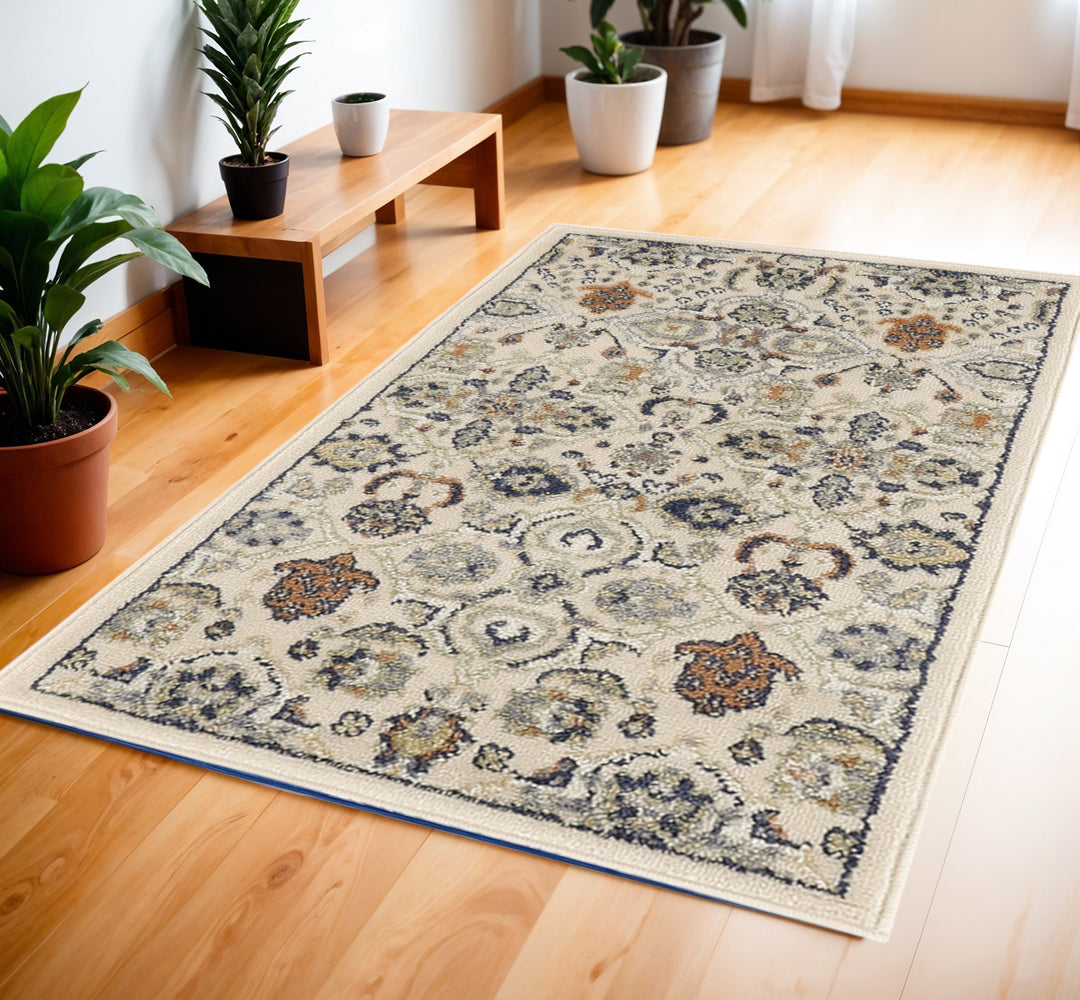 2' X 3' Beige Floral Power Loom Area Rug